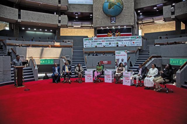 Delegates engaging at a past summit session