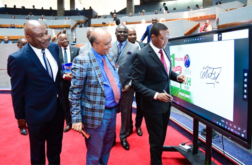 An exhibitor demonstrating on screen