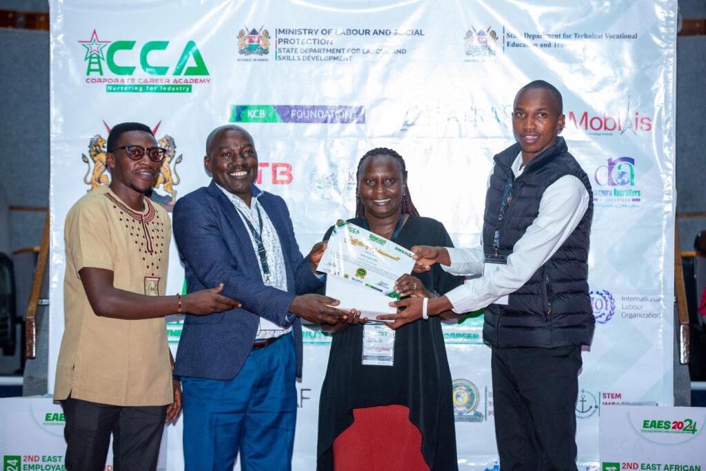 Safaricom receiving the Employer of the Year award